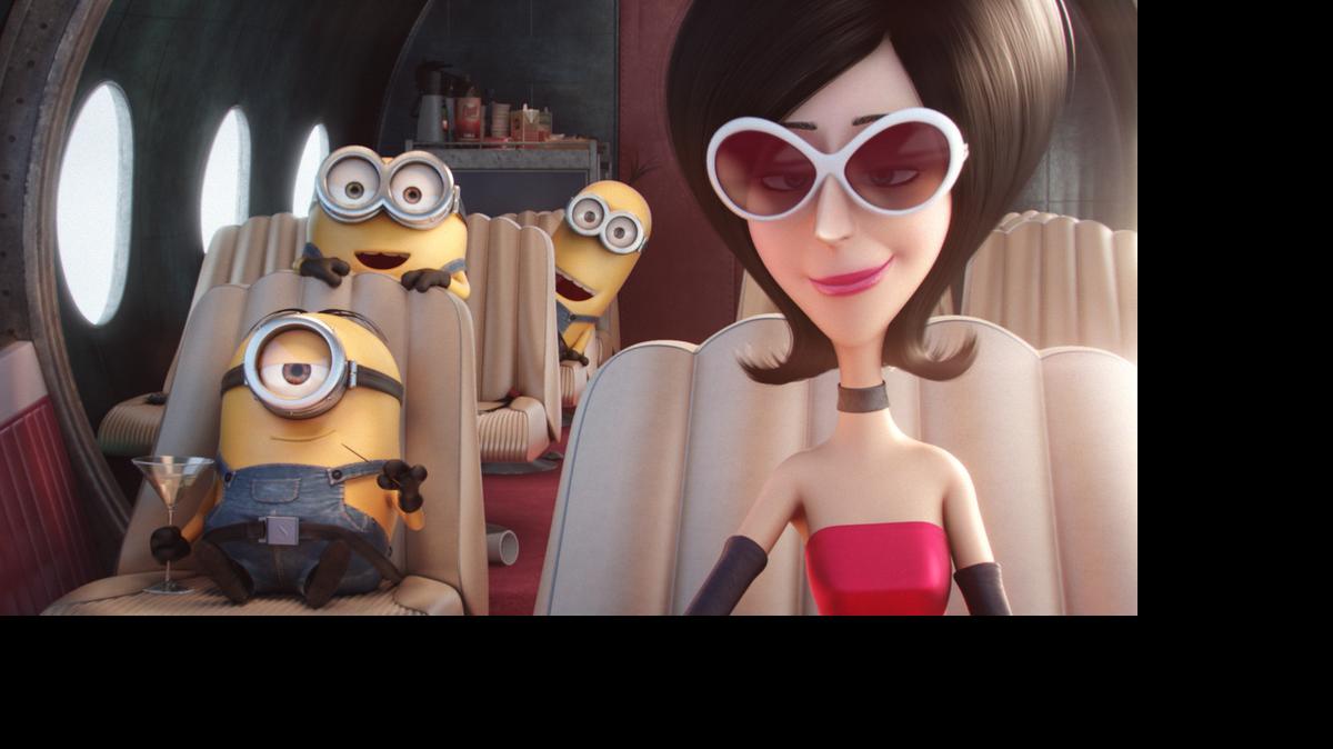 
From left, Minions Stuart, Bob and Kevin ride with Scarlet Overkill, voiced by Sandra Bullock, in “Minions.”

