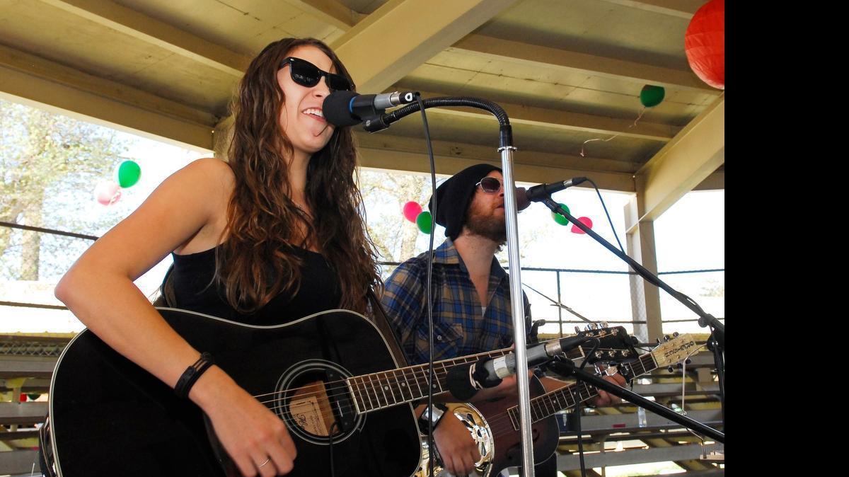 
Cottonwood Creek’s Maggie Watkins performs in Los Banos in 2013. She and bandmate Scott Little will play their folk sound at show in Merced on July 9. 
