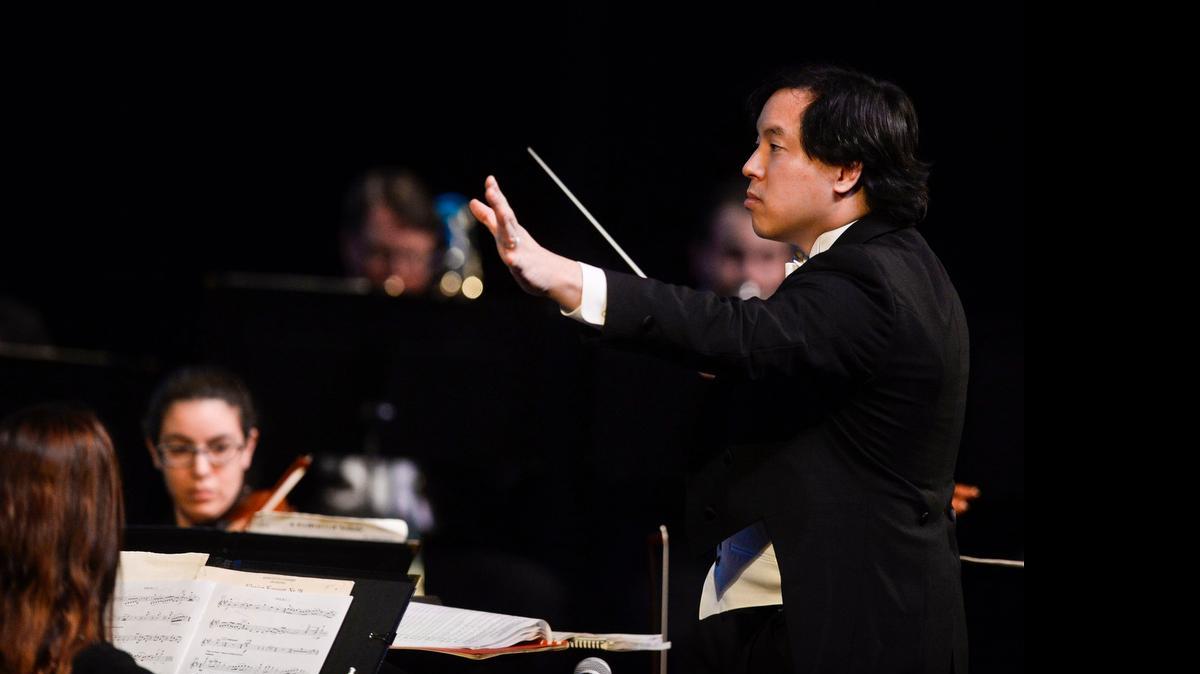 
Conductor Ming Luke leads the Merced Symphony during its annual Pops Concert at the Merced Theatre in January. The Merced Symphony Association in April bumped him up from interim to the full-time conductor, according to the symphony’s president.
