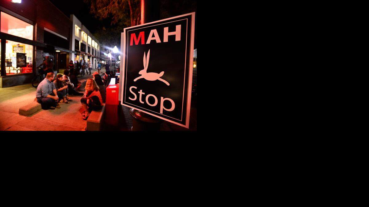 
Pedestrians sit outside Cold Stone Creamery during the Merced Art Hop in October. The quarterly downtown event resumes on Jan. 17.
