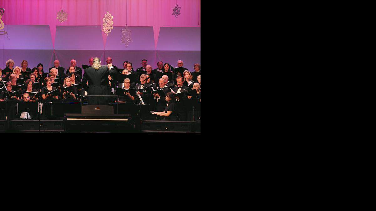 
Led by conductor Curtis Nelson, the Merced College Chorale and Chamber Singers is shown performing its annual “Christmas Classics and Carols” concert in 2008.
