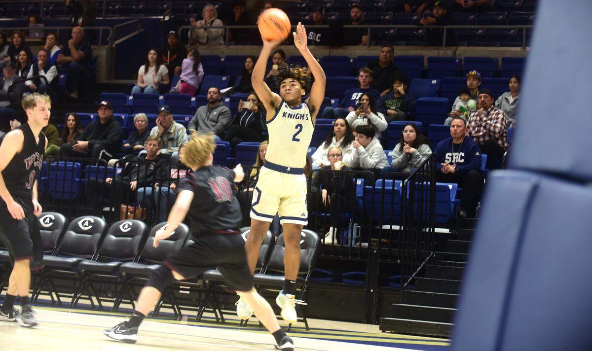 Stone Ridge Christian sophomore Daijon O’Neil shoots a 3-pointer during the Sac-Joaquin Section Division VI championship game against Valley Christian at UC Davis on Friday, Jan. 23, 2024.