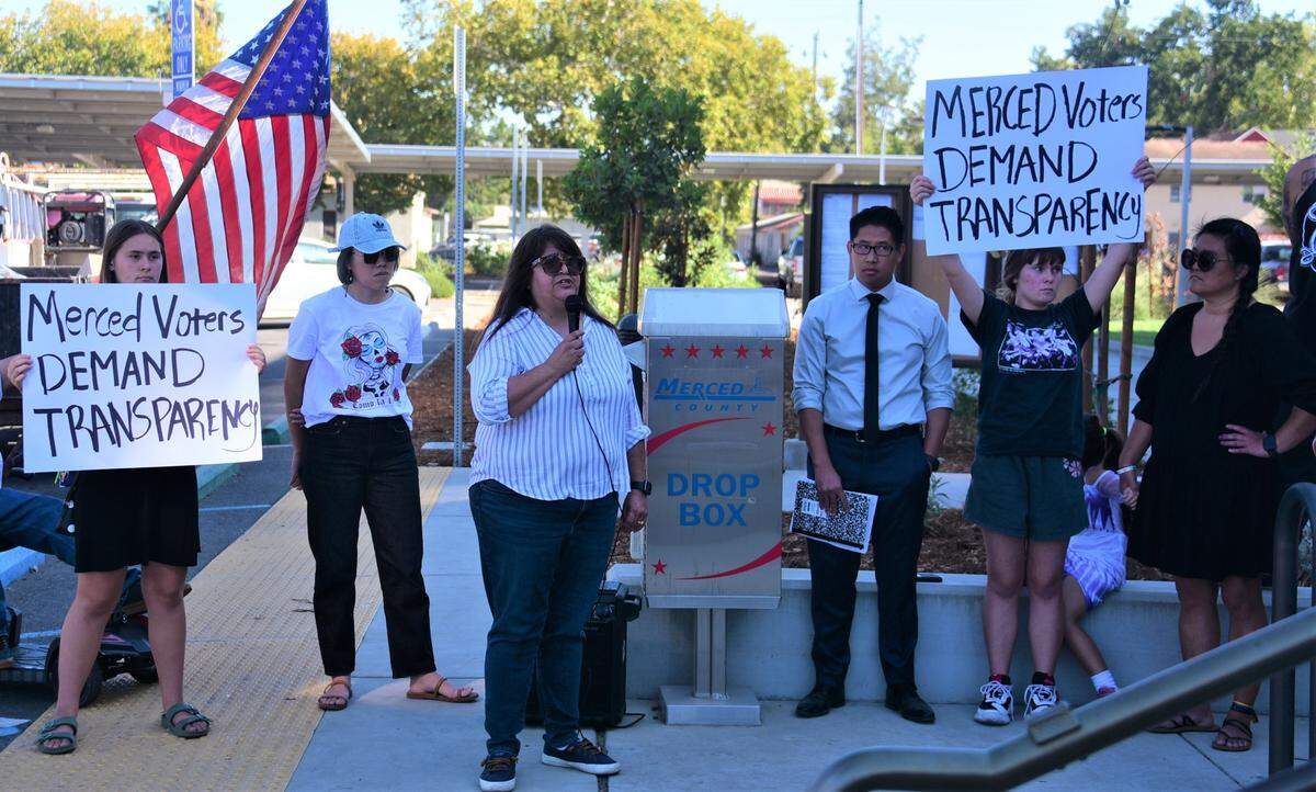 Merced City Council Member Bertha Perez speaks to protesters Friday, Oct. 14, 2022, outside the Merced County Elections Office about errors that appeared on election ballots sent out in some Merced County precincts.