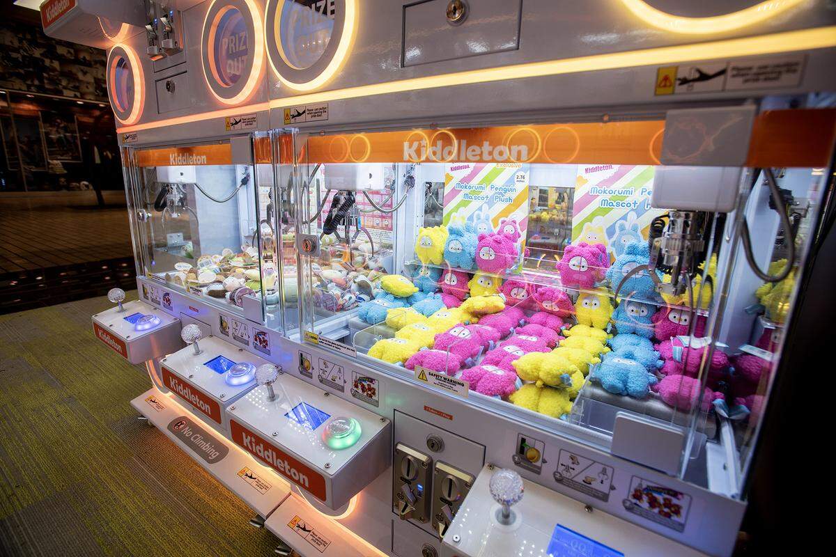 Claw machines filled with plush toys at the Kiddleton arcade, located inside the Marketplace at Merced in Merced, Calif., on Friday, Aug. 8, 2025. 