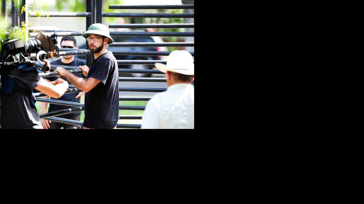 Filmmaker Rodrigo Reyes, center, directs during a film shoot at Applegate Park on Tuesday.
