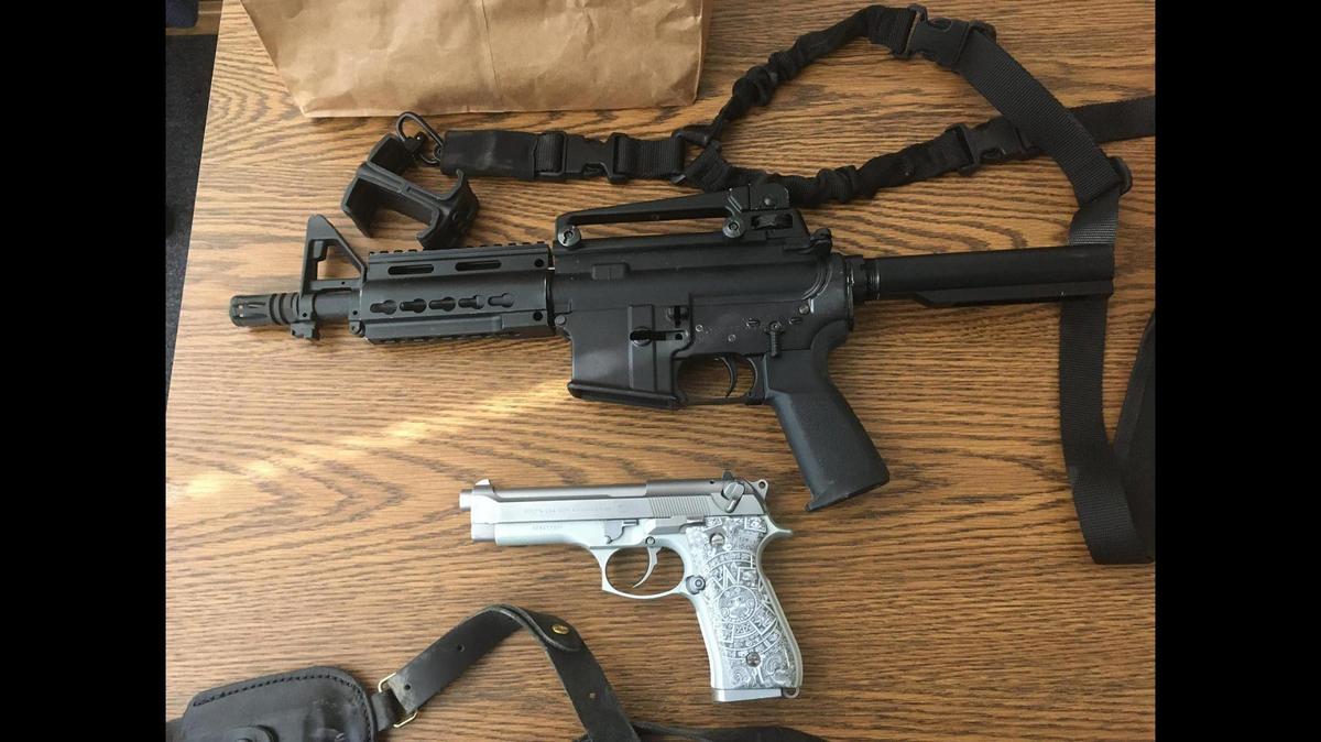Police located firearms and ammunition inside the Gustine home of two men identified as suspects in connection with a Jan. 19 shooting in Los Banos, according to the Los Banos Police Department. The men were arrested during a Butte County traffic stop. Image courtesy of Los Banos Police Department.