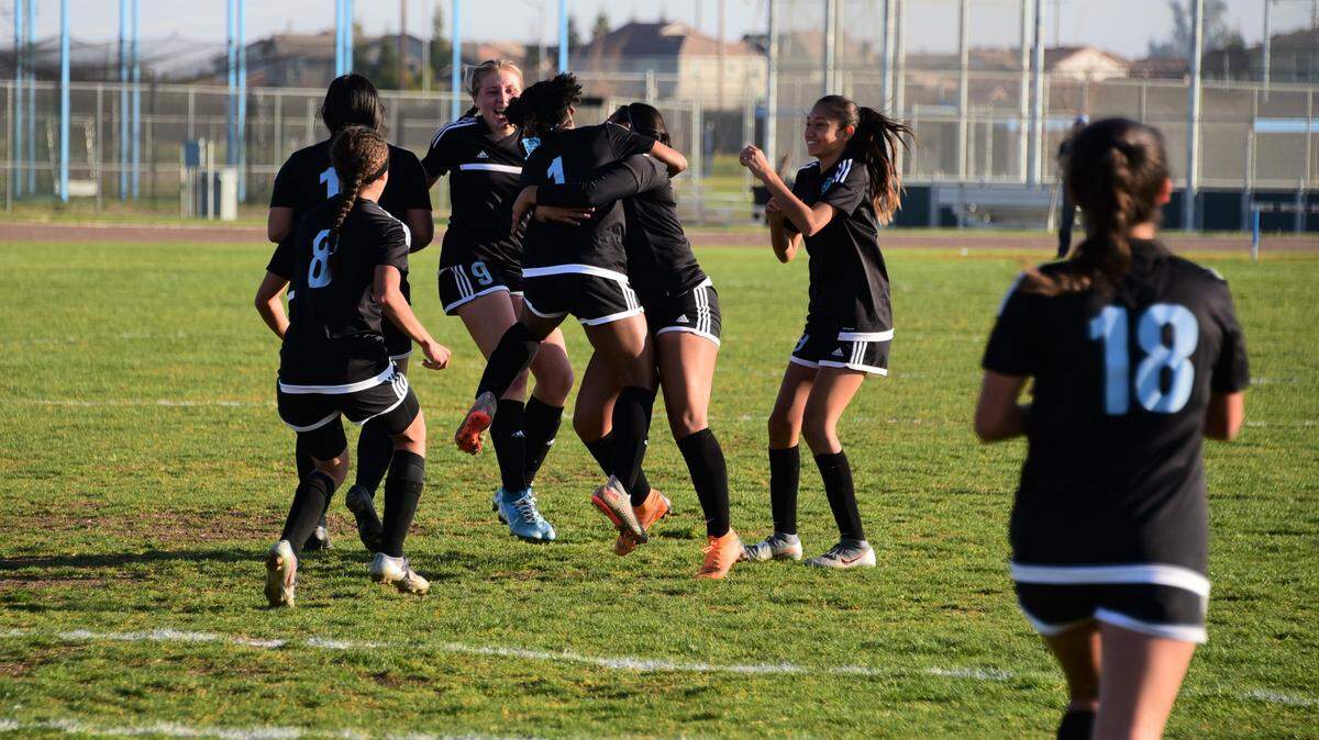El Capitan High junior Haley Espinoza (3) celebrates with her teammates after scoring the only goal in the Gauchos’ 1-0 playoff win over Rosemont on Wednesday, Feb. 19, 2020 at El Capitan High School.