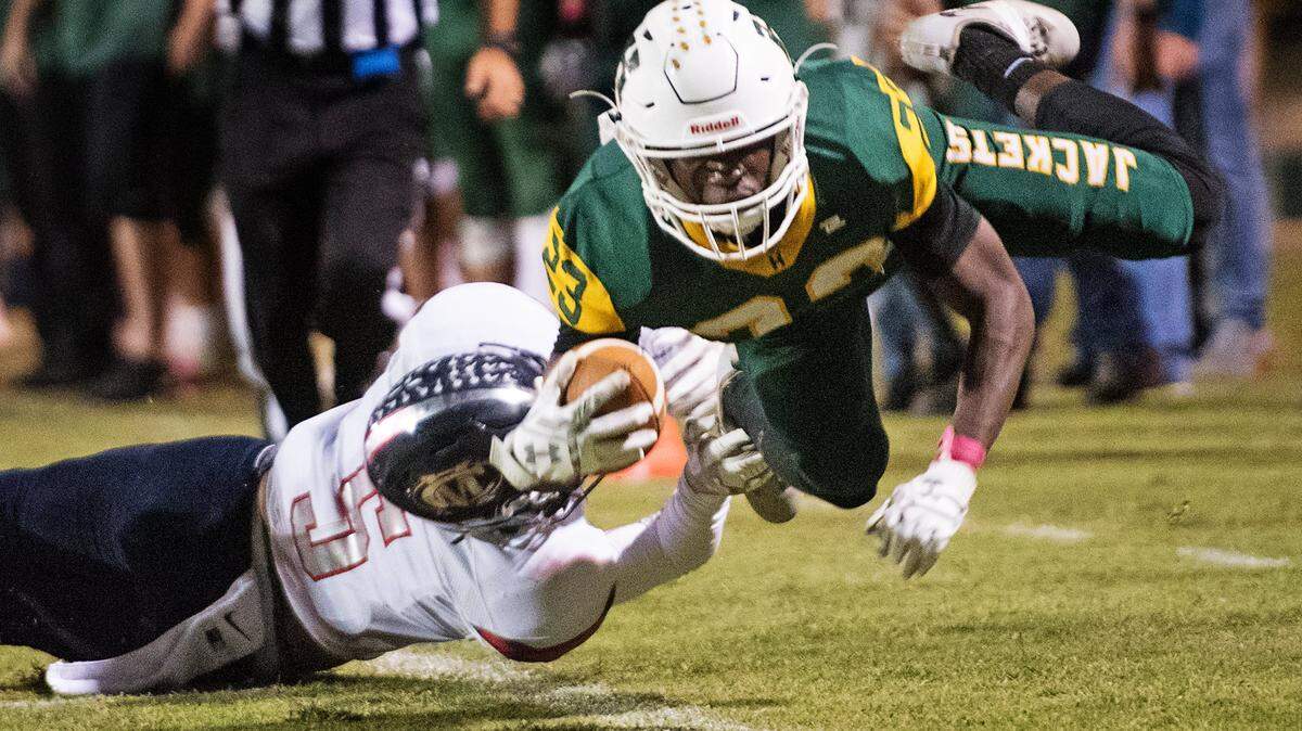 This photo of Hilmar’s Issac Sharp getting knocked out of bounds by Modesto Christian’s Mario Hernandez won first place at the George F. Gruner Awards Wednesday night.