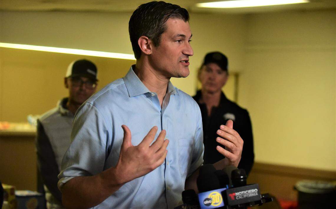 Merced Mayor Matthew Serratto speaks to reporters about the recent storms and flooding to hit Merced at a press conference at the evacuation center set up at the Merced County Fairgrounds on Saturday, Jan. 14, 2023.