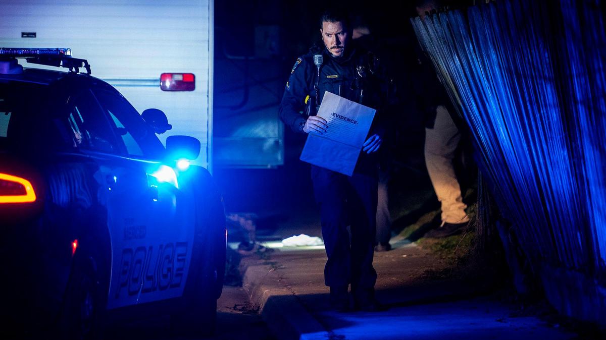 Merced Police Department detectives investigate the scene of a shooting that injured a 27-year-old man in the 1500 block of La Mirada Drive in Merced, Calif., on Monday, Jan. 31, 2022.
