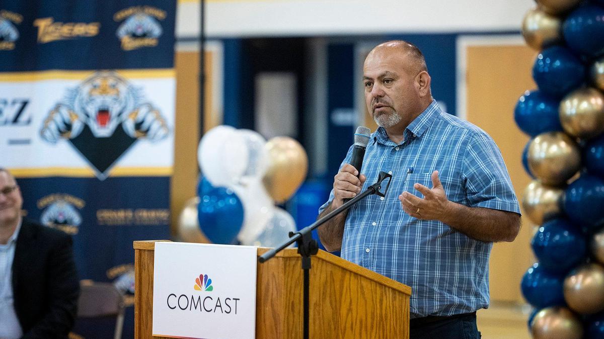 Merced County District 1 Supervisor Rodrigo Espinosa, speaks to eighth-graders during a ceremony announcing a $4.5 million investment by Comcast to bring high-speed internet and broadband services to the area, at Cesar E. Chavez Middle School in Planada, Calif., on Monday, April 17, 2023. According to Nathan Ahle, Comcast Director of Government Affairs for the South Valley, the $4.5 million investment involves extending the existing network from nearby Merced into the town of Planada.