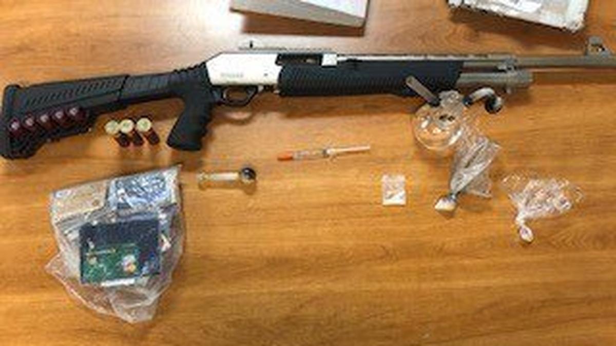 Police say they found evidence of possible identity theft, mail fraud and other crimes after searching a hotel room two robbery suspects were staying in.