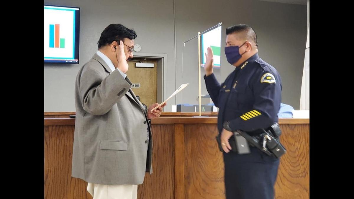 Livingston Police Chief Chris Soria, right, was sworn in as the City’s top law enforcement officer by Mayor Gurpal Samra, left, in August. Soria has been with the department for over 35 years and has risen through the ranks after starting his career in Livingston as a Reserve Patrol Officer. Image courtesy of Livingston Police Department.