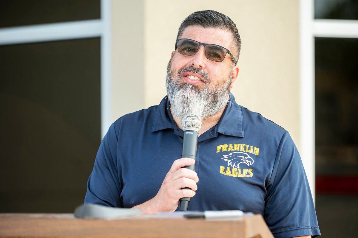 Franklin Elementary School Principal Cesar Hernandez speaks during a ribbon cutting ceremony to celebrate the opening of a new Administrative Services building on the campus of Franklin Elementary School in Merced County, Calif., on Wednesday, July 24, 2024. The roughly 3,500 square foot facility is equipped to support the Franklin Elementary School staff, students and their families.