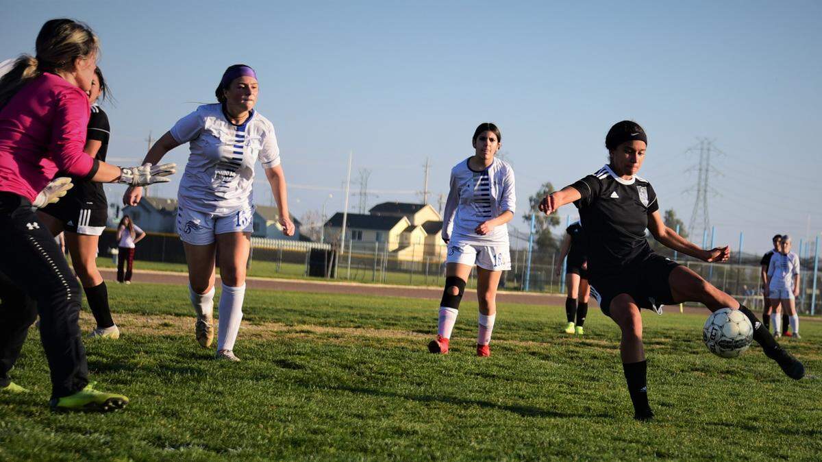 El Capitan High senior Anaya Shelton scores one of her two goals in a 6-0 playoff win over Mountain House on Friday, Feb. 11, 2022 at El Capitan High School in Merced, Calif.