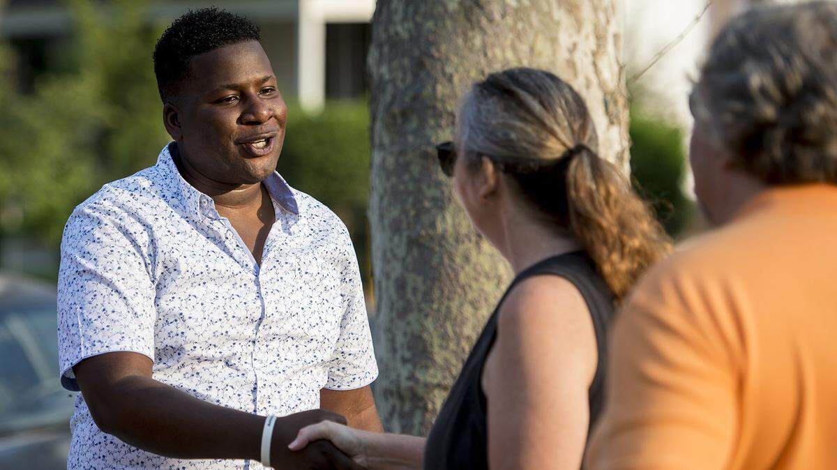 Merced City Council District 6 candidate, Delray Shelton, greets guests during his campaign kickoff party at the Mansion House in Merced, Calif., on Thursday, Aug. 23, 2018. Shelton is a Sgt. with the Merced County Sheriff’s Office.
