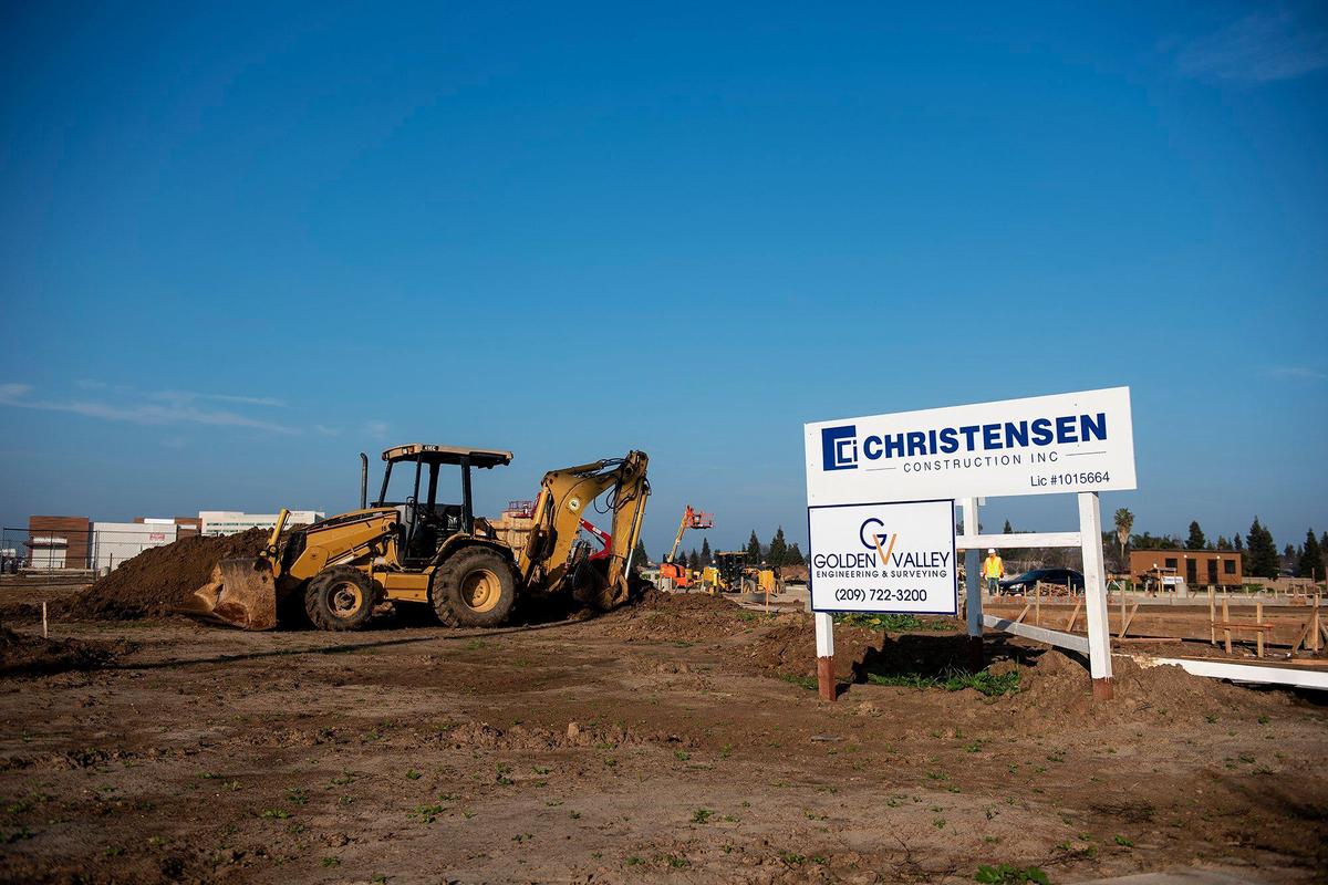 Construction continues at the 21.5-acre Yosemite Crossing site located near the intersection of Yosemite Avenue and G Street in Merced, Calif., on Thursday, Jan. 20, 2022.