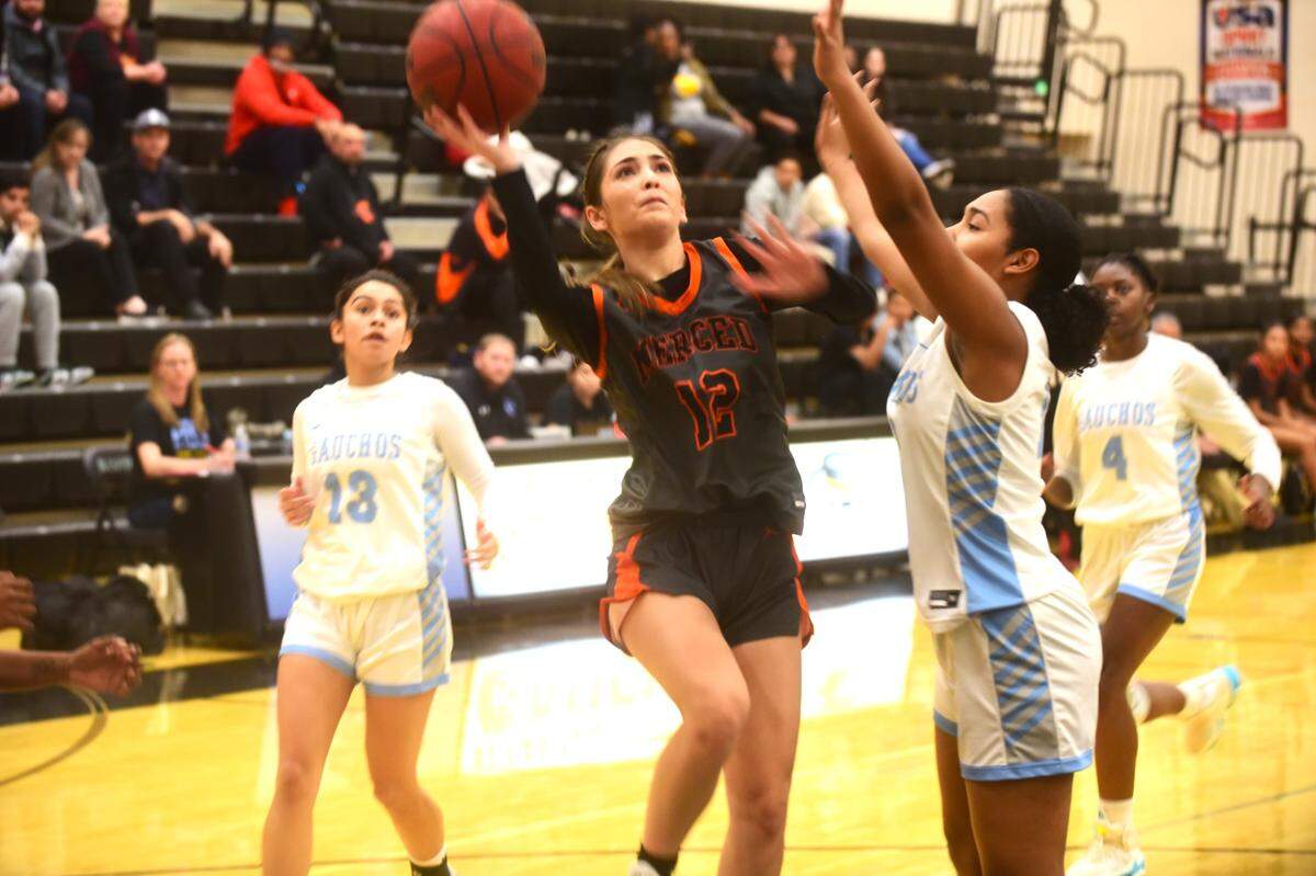 Merced High School sophomore guard Amiya Brown (12) goes up for a shot during a game against El Capitan on Thursday, Jan. 4, 2024.