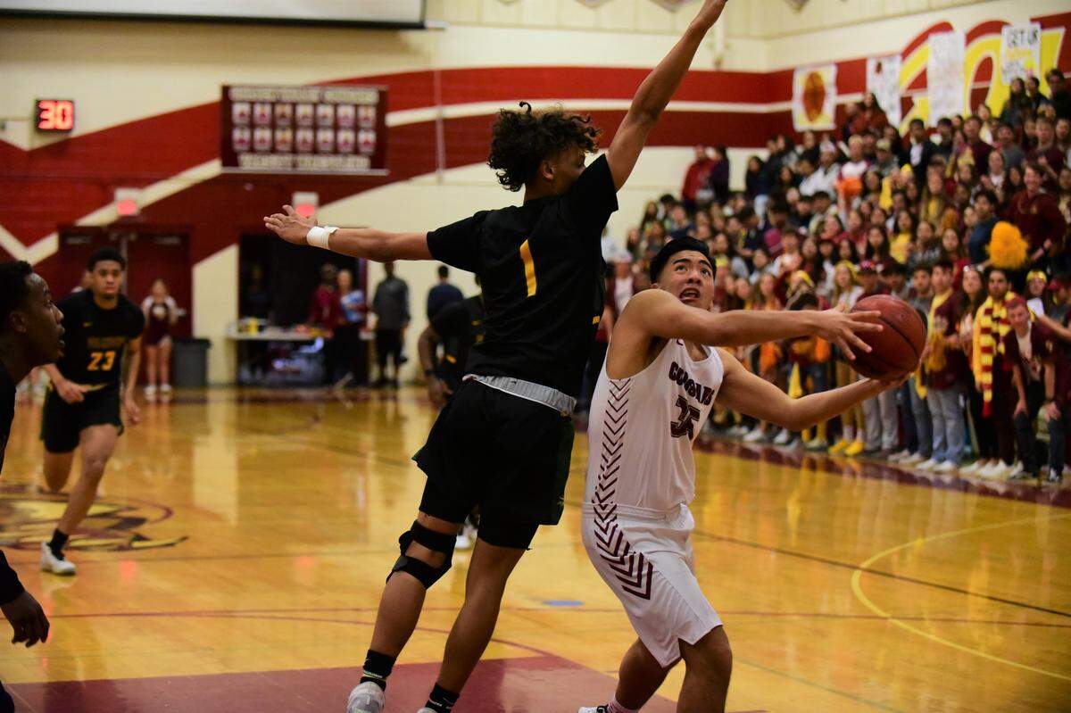 Golden Valley sophomore Mateo Tangaan goes up for a shot during the Sac-Joaquin Section Division III semifinal game against Vanden at Cougar Arena on Tuesday, Feb. 25, 2020.