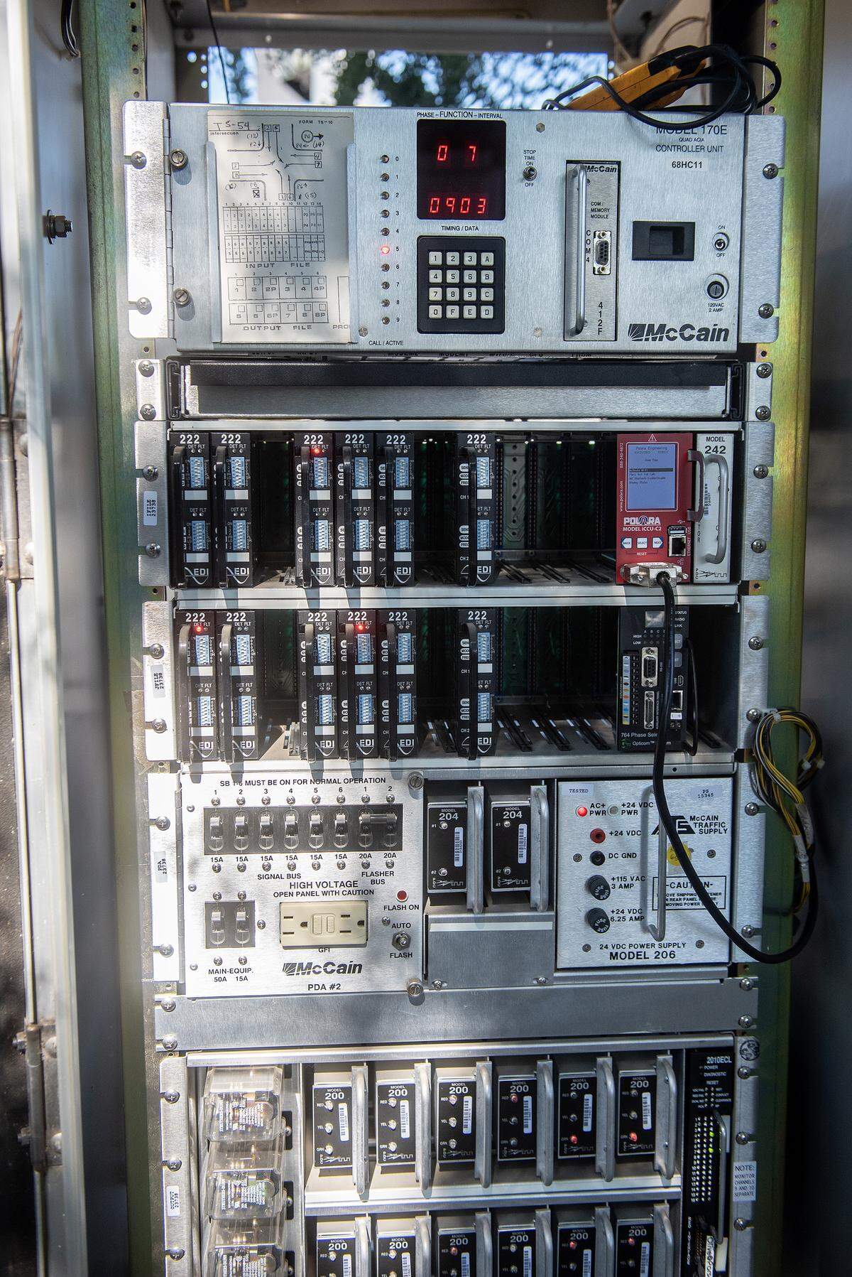 A traffic signal cabinet at the intersection of Olive and Parsons avenues in Merced, Calif., on Thursday, July 31, 2025. City of Merced lighting technicians perform routine maintenance on the city’s signal cabinets to ensure proper operation. 