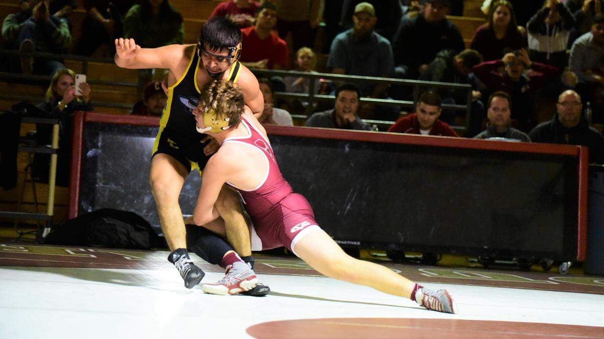 Golden Valley’s Jaret Mello records a takedown in overtime to defeat El Capitan’s Jose Martinez 7-5 during the Cougars’ 37-27 win over the Gauchos on Tuesday, Jan. 28, 2020 at Cougar Arena.