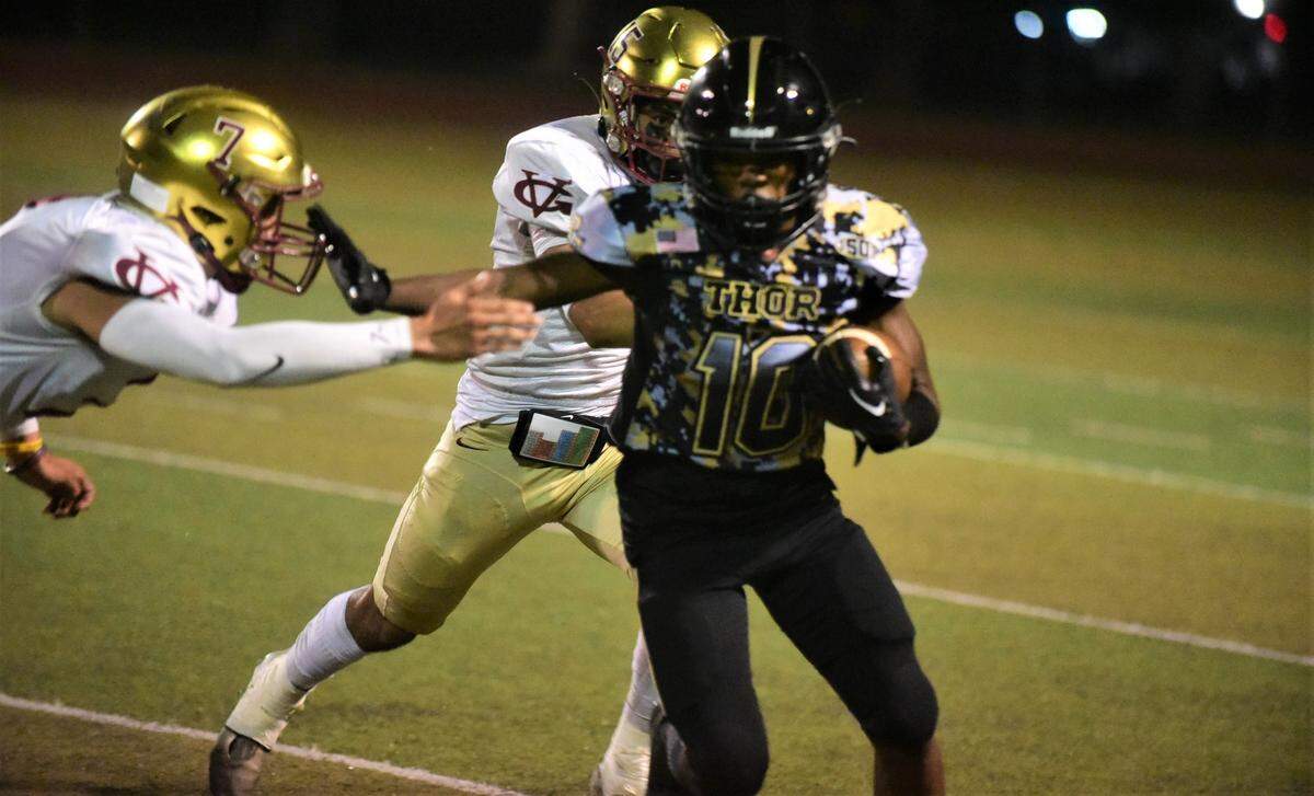Buhach Colony High School junior Eric Thrasher runs the ball against Golden Valley on Friday, Sept. 16, 2022 at Dave Honey Stadium in Atwater, Calif.