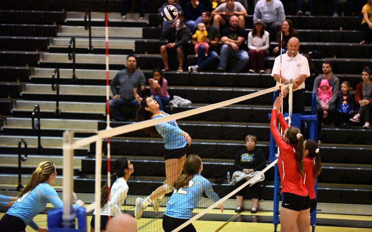 El Capitan senior Yatzary Lua goes up for a hit against Beyer in a Sac-Joaquin Section Division III playoff game on Tuesday, Oct. 29, 2019.
