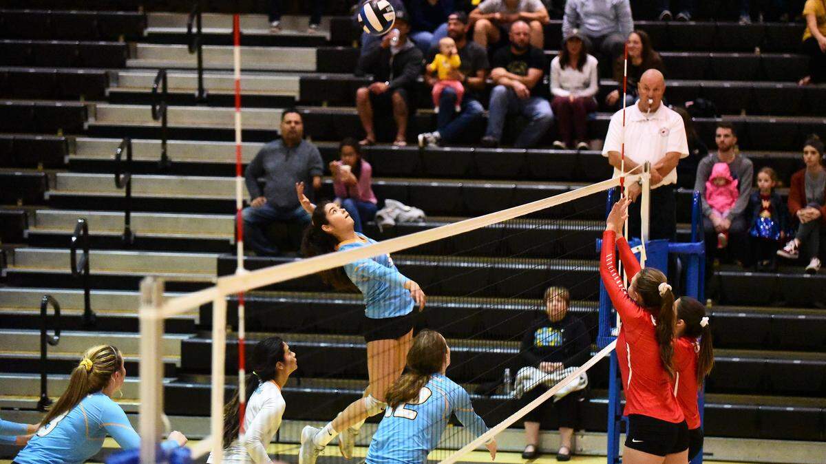 El Capitan senior Yatzary Lua goes up for a hit against Beyer in a Sac-Joaquin Section Division III playoff game on Tuesday, Oct. 29, 2019.