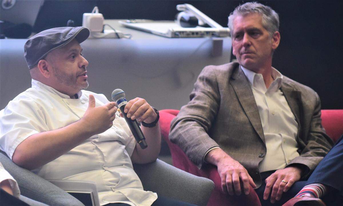UC Merced Chef Matt Perez speaks during a town hall meeting held on campus while UC Merced Vice Chancelor of Student Affairs Charles Nies looks on. Students voiced their concerns over food that is served on campus.