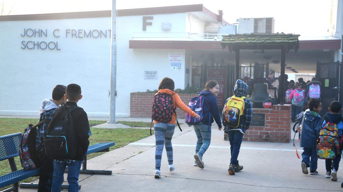 Students take the bus and walk to John C Fremont Elementary School on Friday, Jan. 25, 2019, in Merced.