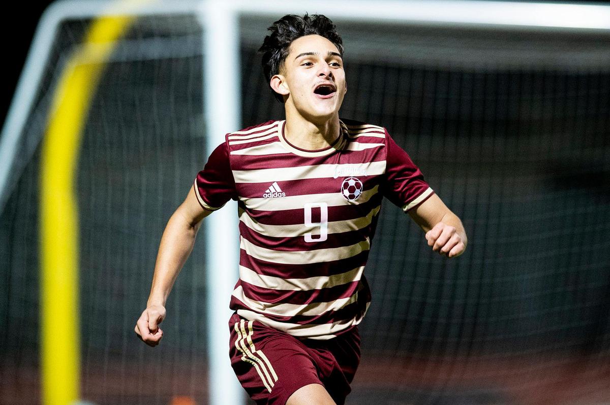 Golden Valley senior Carlos Miranda (9) celebrates after scoring a goal against Rocklin during a Division 2 playoff game at Golden Valley High School in Merced, Calif., on Tuesday, Feb. 13, 2024. The Cougars beat the Thunder 3-0.