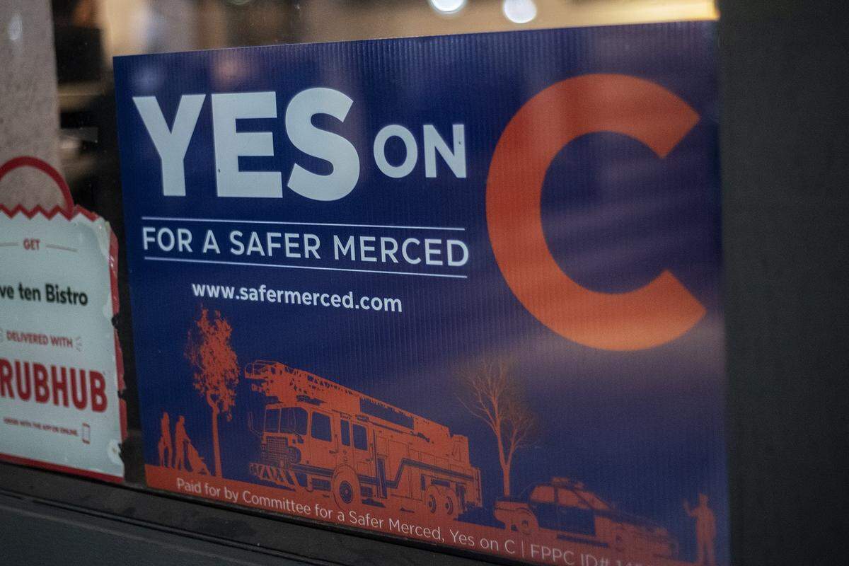 A sign promoting Measure C in a front window of Five Ten Bistro in Merced, Calif., on Tuesday, March 5, 2024.