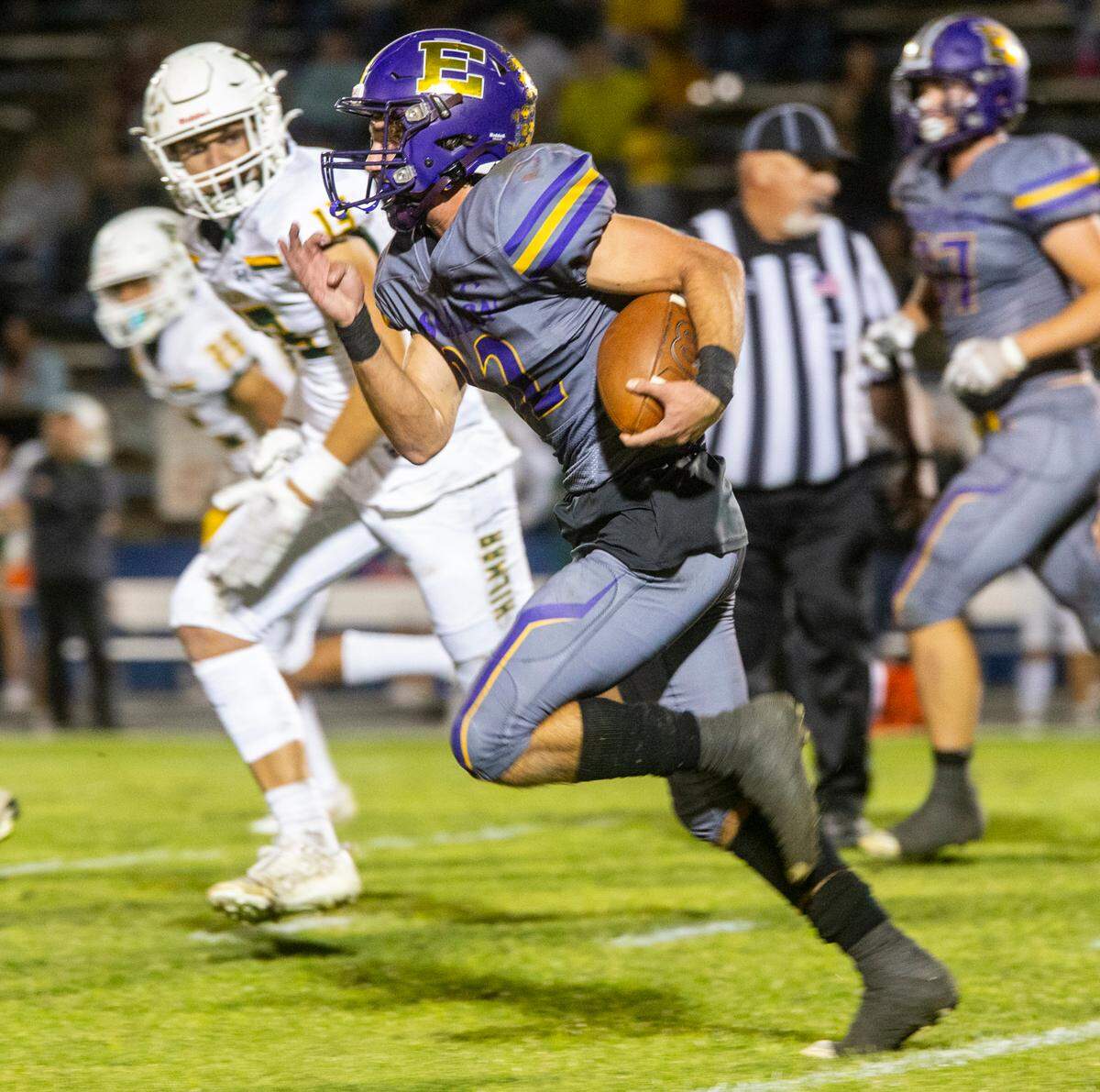 Talan Reider, 32, of Escalon High works his way down the field for a 80 yard touchdown run in the first half of Friday Oct. 13, 2023 nights game against Hilmar High.