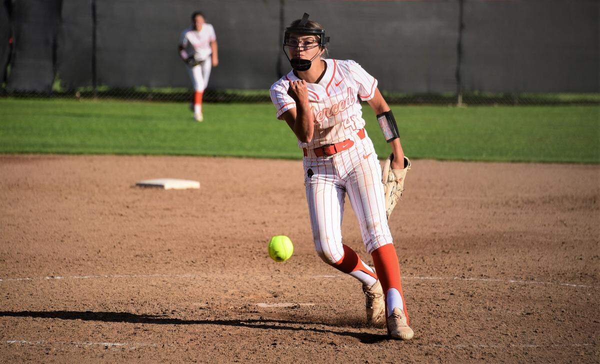 Merced High senior pitcher Melody Gomez delivers a pitch during a 4-3 win over Golden Valley on Thursday, March 31, 2022 at Merced High School.