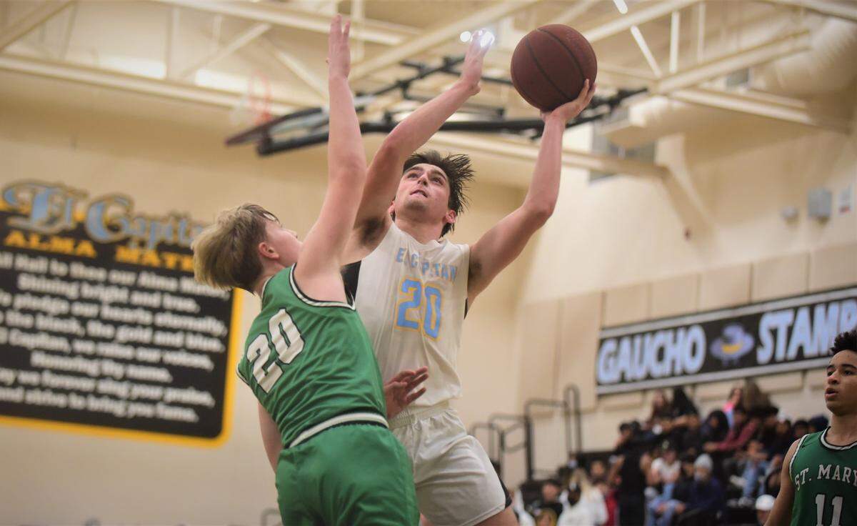 El Capitan High junior Brody Collins goes up for a shot against St. Mary’s during a play-in game on Wednesday, Feb. 16, 2022 at the Stable Center at El Capitan High School.
