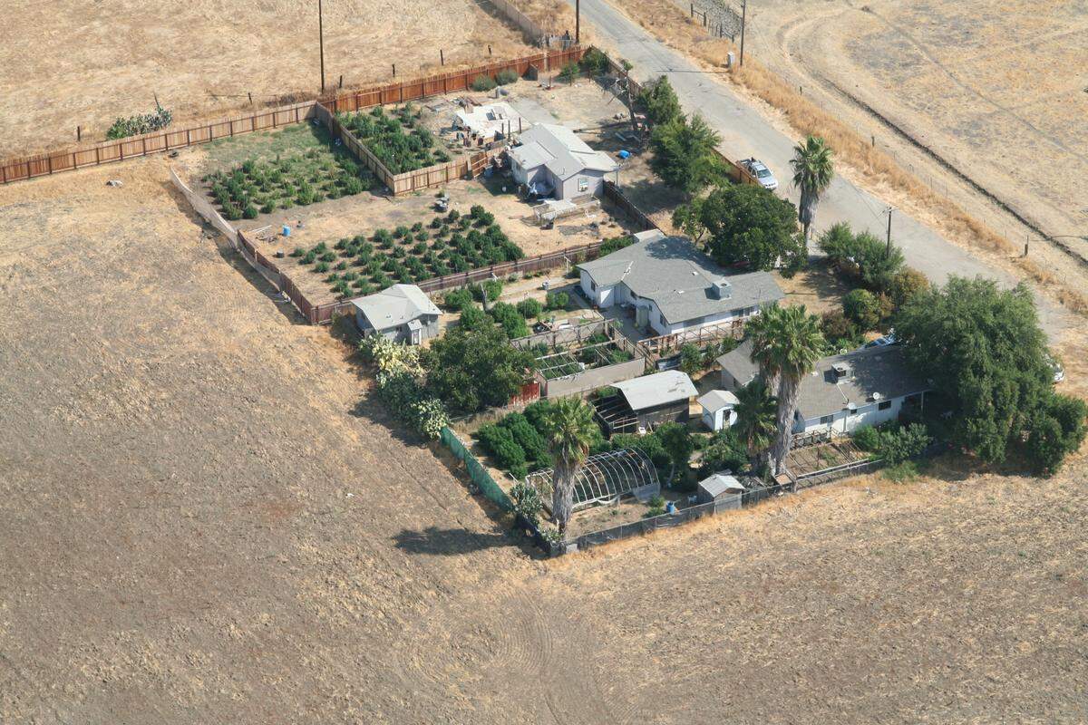 This aerial shot of the properties at 371, 419 and 429 R Street in south Merced by the Merced County Sheriff’s Office Aviation Unit shows the illegal marijuana grows that were eradicated Friday, Sept. 7, 2018, Sgt. Ray Framstad said.