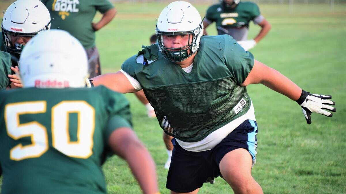 Le Grand junior offensive lineman Fermin Villegas looks to block a defender during practice on Wednesday, Aug. 11, 2021 .