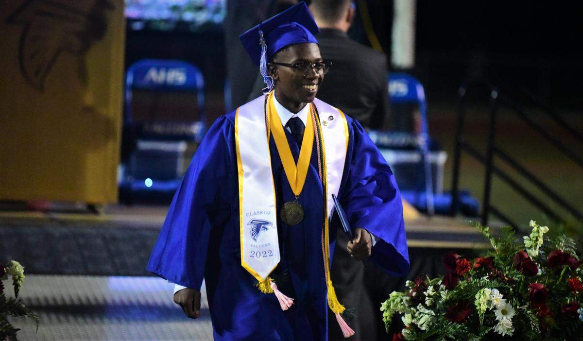 Atwater High School senior Thomas Garner makes his way of the stage after receiving his diploma during the Atwater High School graduation ceremony on Thursday, May 2, 2022.