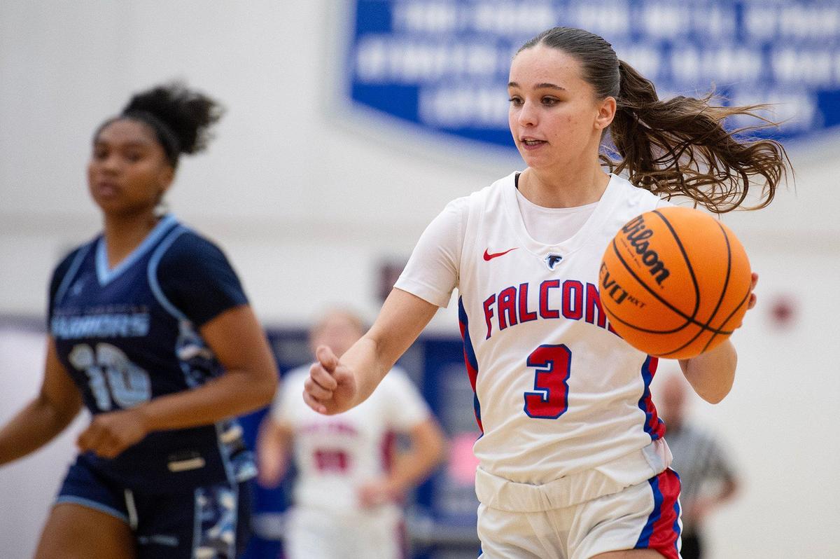 Atwater junior Saige Harcksen (3) dribbles up the court during a CIF NorCal Division II playoff game against Valley Christian at Atwater High School in Atwater, Calif., on Tuesday, March 4, 2025. The Falcons beat the Warriors 58-39.