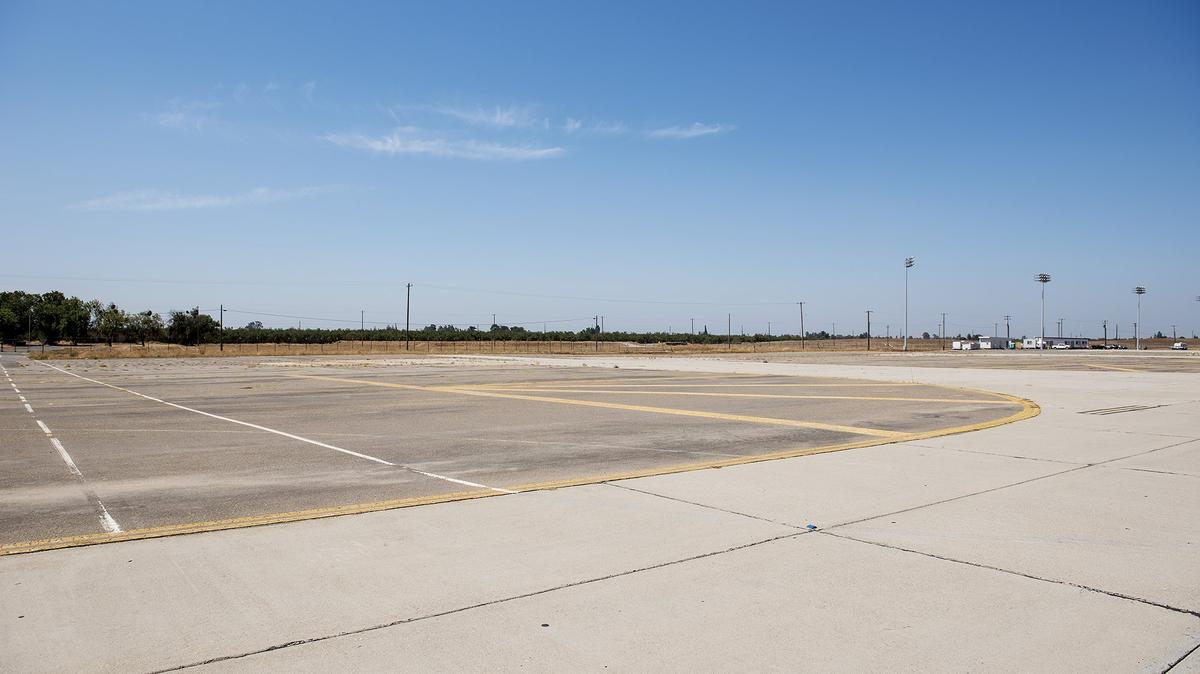 A section of land near the runway at the former Castle Air Force Base is seen in Atwater, Calif., on Wednesday, Aug. 29, 2018. According to Mark Hendrickson, department director of Merced County Commerce Aviation and Economic Development, the county has plans to turn the land into part of a Mid California International Trade District. The plans call for a section of land at the former military base to be developed into a high-tech environment for the testing of autonomous vehicles as well as associated equipment, according to Hendrickson.