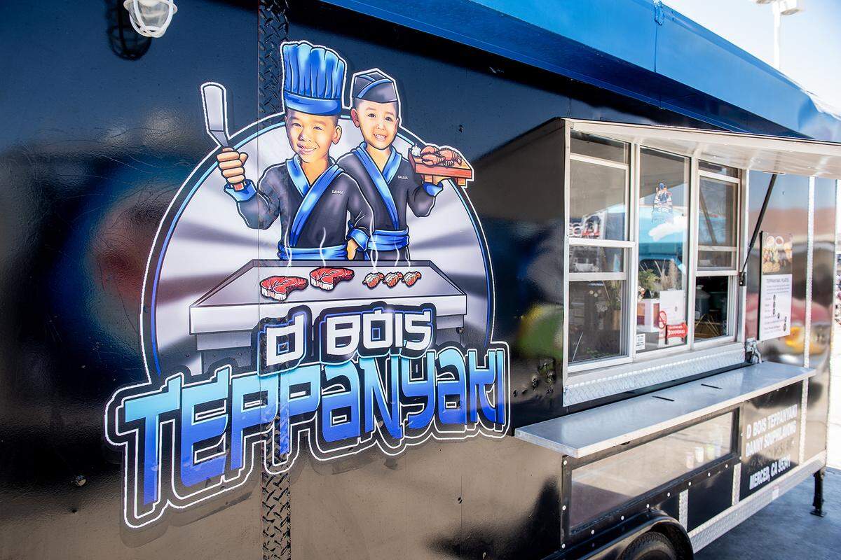 The d Bois Teppanyaki food truck open for business at a food truck parking area in the lot of Courtesy Rent a Car, 1055 W. 15th Street in Merced, Calif., on Tuesday, Aug. 12, 2025. The location currently hosts up to nine food trucks offering various cuisine options. 