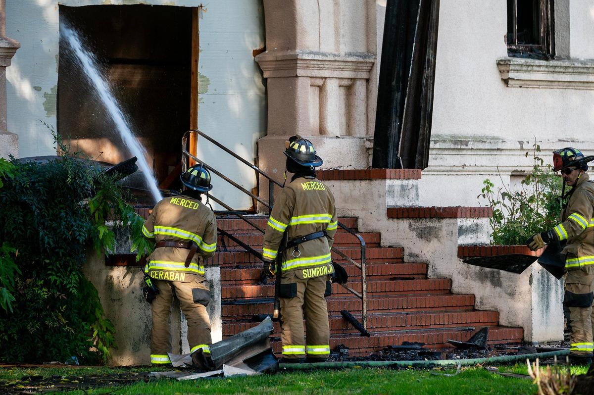 City and county fire crews respond to a structure fire at the historic Merced County High School building located at 2125 M Street in Merced, Calif., on Monday, Dec. 2, 2024. Fire officials said the cause of the fire is under investigation.
