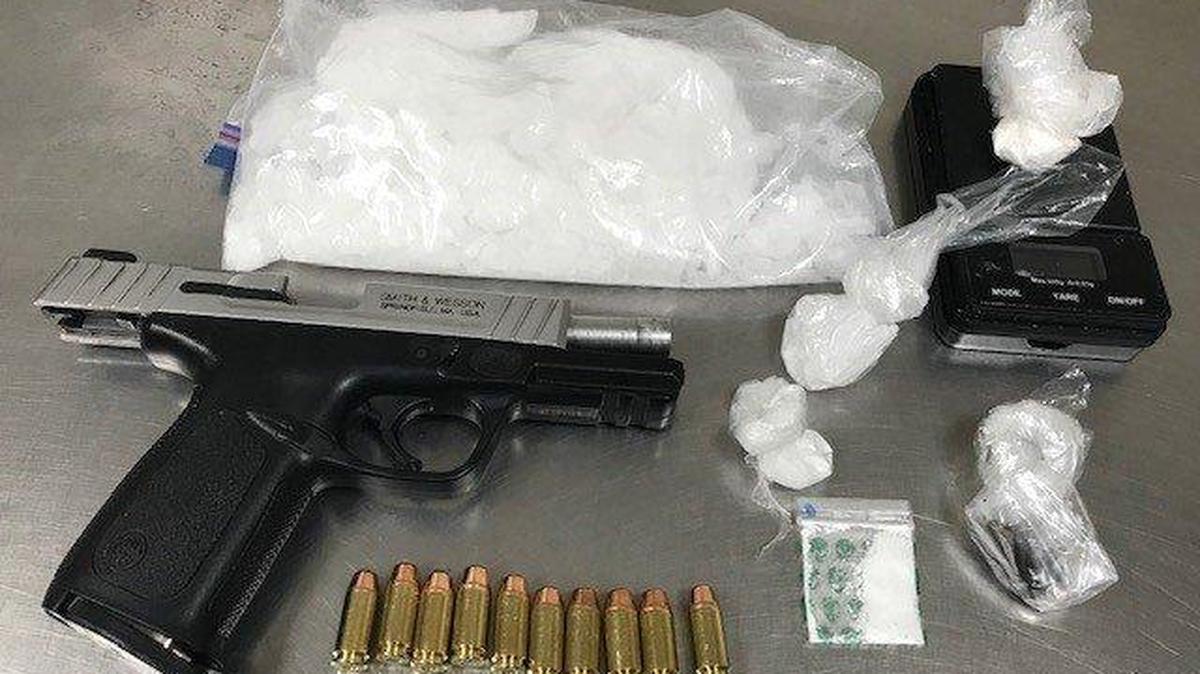 Merced police said three people were arrested after Gang Violence Suppression Unit officers discovered drugs and a firearm at a home in Atwater. Photo courtesy of the Merced Police Department.