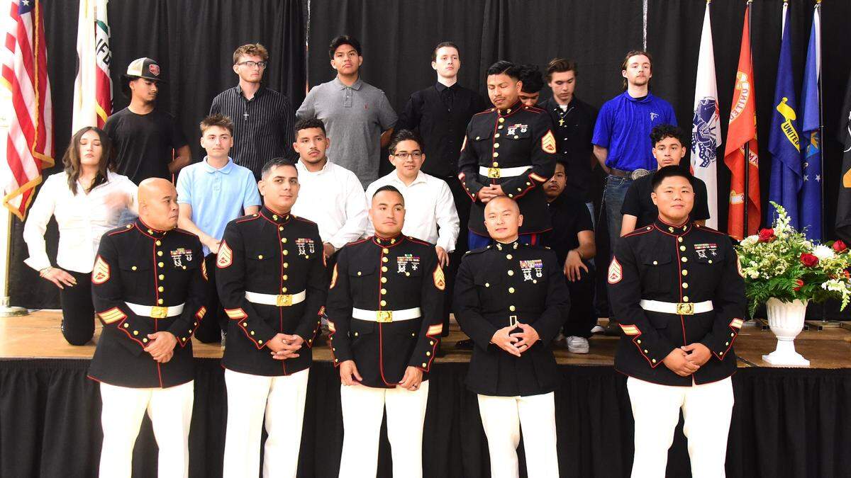 Merced Union High School District seniors set to enlist in the Marines pose for photos during the district’s second Salute to Service Luncheon on Tuesday, May 13, 2025 at Merced High School.