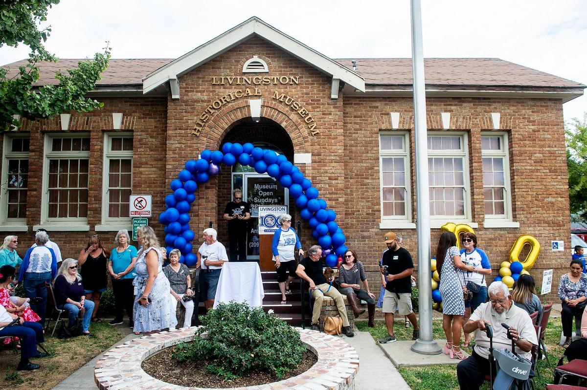 People gather outside the Livingston Historical Museum during the City of Livingston’s centennial celebration in Livingston, Calif., on Sunday, Sept. 11, 2022.