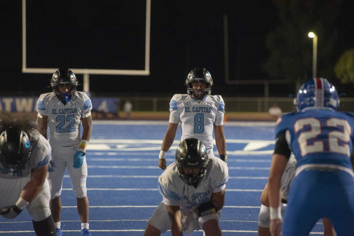 El Capitan quarterback Sergio Mendoza (8) and running back Lorenzo Peters (22) prepare for a snap during the Gauchos’ road matchup against Atwater on Friday night. Peters scored four total touchdowns in the 49-41 loss.