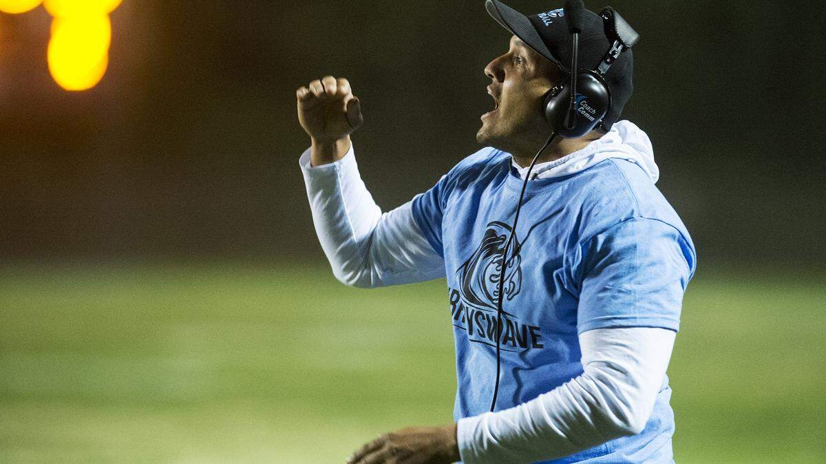 El Capitan head coach Frank Solis yells to his players during a game against Merced at Stadium ’76 in Merced, Calif., on Friday, Oct. 13, 2017. The Bears beat the Gauchos 56-14.
