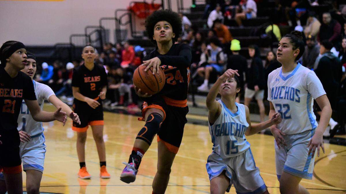Merced High senior Sierra Smith drives the lane during a game against El Capitan on Thursday, Jan. 9, 2020 at El Capitan High School in Merced, Calif.
