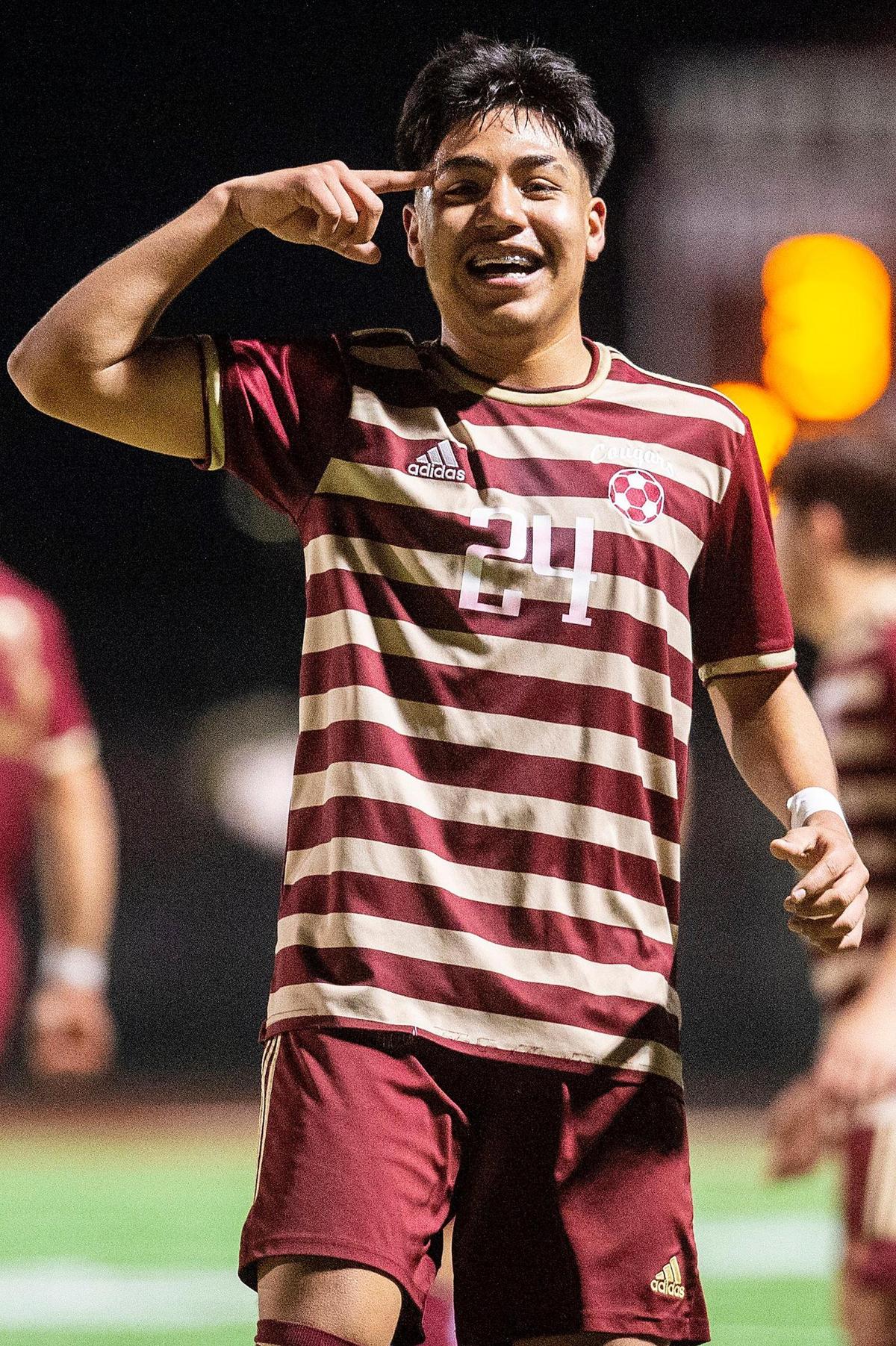Golden Valley junior Jose Ontiveros (24) celebrates after scoring a goal during a Division 2 playoff game against Rocklin at Golden Valley High School in Merced, Calif., on Tuesday, Feb. 13, 2024. The Cougars beat the Thunder 3-0.