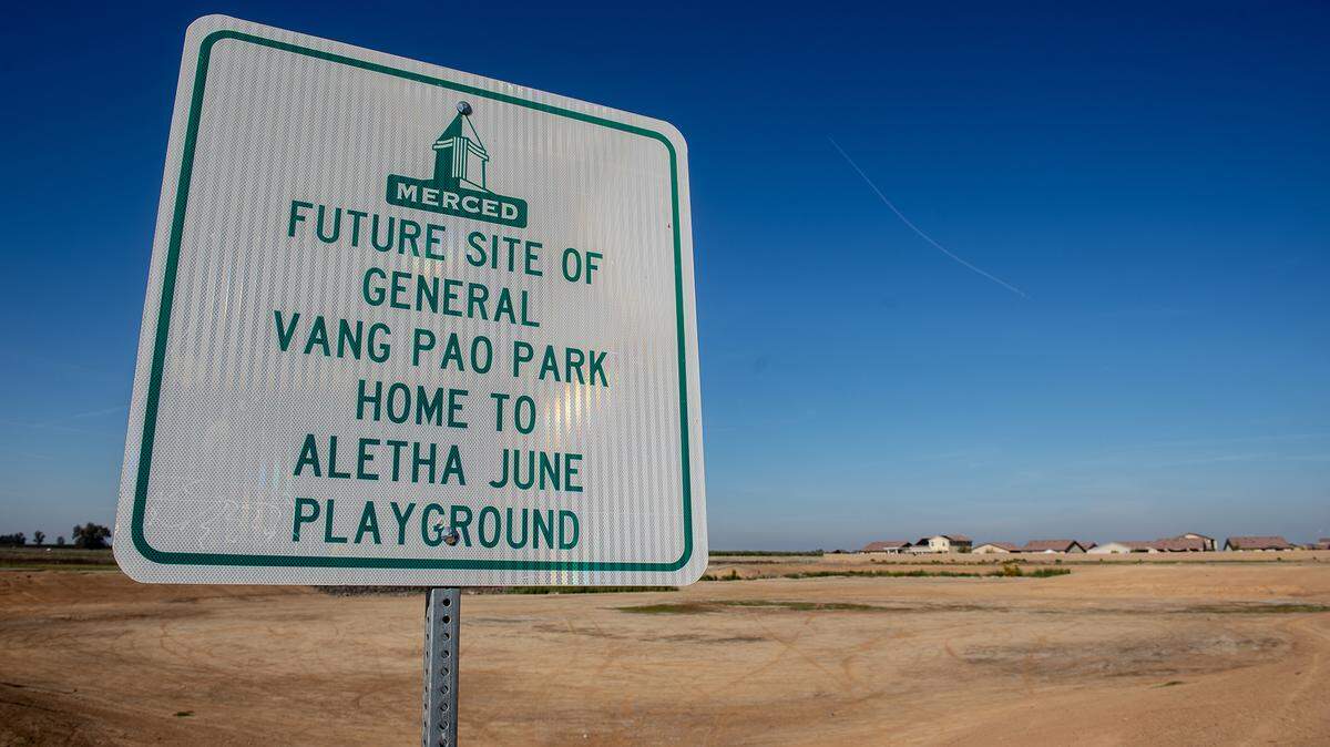 A sign indicates the future site of General Vang Pao Park and the Aletha June playground near the intersection of West Cardella Road and Freemark Avenue in Merced, Calif., on Thursday, Oct. 30, 2025. 